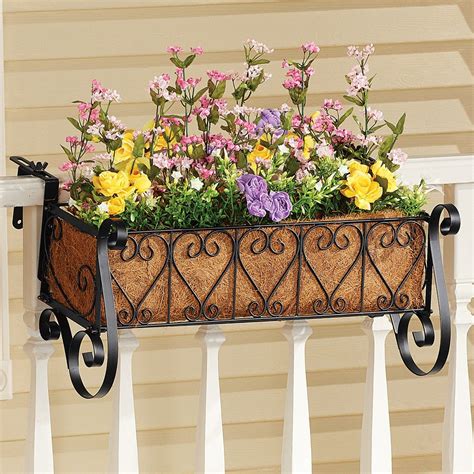 black planter boxes hanging off a metal rail|Amazon.com: Metal Railing Planter.